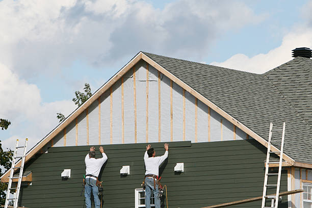 Professional Siding Replacement technician working in Blue Rock, OH